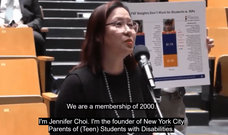 Special Education Advocate Jenn Choi speaks in front of a microphone